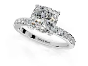 Solitaire Engagement Ring Setting for Cushion Cut Center with Round Cut Pave Band and Prong Head in Platinum