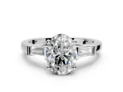3 Stone Engagement Ring Setting for Oval Center with Channel Baguette Accents and Prong Head in Platinum