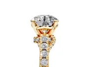 Solitaire Engagement Ring Setting for Round Cut Center with Crossover Accents and Prong Head in Yellow Gold