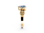 Leaf Engagement Ring Setting for Fancy Blue Pear-Shaped Center with Milgrain Accent Band and Prong Head in Yellow Gold