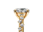 Solitaire Engagement Ring Setting for Oval Center with Trailing Leaf Accent Band and Prong Head in Yellow Gold