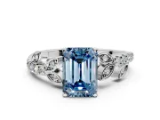 Leaf Motif Engagement Ring Setting for Fancy Blue Emerald Cut Center with Pave Band and Prong Head in Platinum