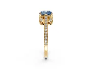 Cathedral Engagement Ring Setting for Fancy Blue Cushion Cut Center with Antique-Style Pave Band and Prong Head in Yellow Gold
