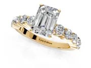 Shared-Prong Engagement Ring Setting for Emerald Cut Center with Graduated Accents and Prong Head in Yellow Gold