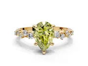 Solitaire Engagement Ring Setting for Fancy Yellow Pear-Shaped Center with Trailing Leaf Accent Band and Prong Head in Yellow Gold