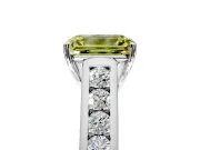 Solitaire Engagement Ring Setting for Fancy Yellow Emerald Cut Center with Round Cut Channel Band and Prong Head in Platinum