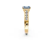 Solitaire Engagement Ring Setting for Fancy Blue Asscher Cut Center with Round Cut Channel Band and Prong Head in Yellow Gold