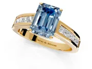 Solitaire Engagement Ring Setting for Fancy Blue Emerald Cut Center with Princess Cut Channel Band and Prong Head in Yellow Gold