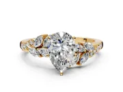 Solitaire Engagement Ring Setting for Pear-Shaped Center with Marquise Accent Twist Band and Prong Head in Yellow Gold