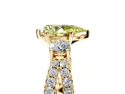 3 Stone Engagement Ring Setting for Fancy Yellow Pear-Shaped Center with Pave Split Shank and Prong Head in Yellow Gold