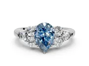 Cluster Engagement Ring Setting for Fancy Blue Pear-Shaped Center with Round Cut Accent Frame and Prong Head in Sterling Silver