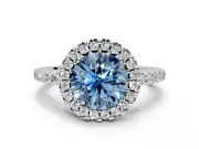 Pave Halo Engagement Ring Setting for Fancy Blue Round Cut Center with Single Row Pave Band and Prong Head in White Gold