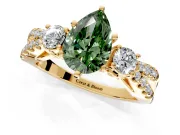 3 Stone Engagement Ring Setting for Fancy Green Pear-Shaped Center with Pave Split Shank and Prong Head in Yellow Gold