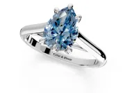 Solitaire Engagement Ring Setting for Fancy Blue Pear-Shaped Center with Cathedral Band and Prong Head in Platinum