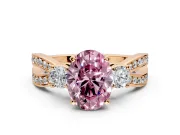 3 Stone Engagement Ring Setting for Fancy Pink Oval Center with Pave Twist Band and Prong Head in Rose Gold