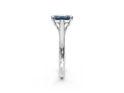 Solitaire Engagement Ring Setting for Fancy Blue Emerald Cut Center with Cathedral Band and Prong Head in White Gold