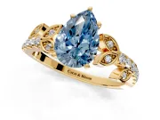 Leaf Motif Engagement Ring Setting for Fancy Blue Pear-Shaped Center with Pave Band and Prong Head in Yellow Gold