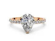 Solitaire Engagement Ring Setting for Pear-Shaped Center with Pave Band and Claw Prong Head in Rose Gold