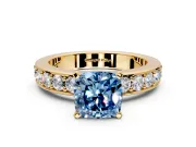 Solitaire Engagement Ring Setting for Fancy Blue Cushion Cut Center with Channel-Set Accents and Prong Head in Yellow Gold
