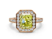 Bezel-Framed Halo Engagement Ring Setting for Fancy Yellow Radiant Cut Center with Pave Band and Prong Head in Rose Gold
