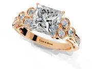 Cluster Engagement Ring Setting for Princess Cut Center with Bezel Accent Clusters and Prong Head in Rose Gold