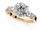5 Stone Engagement Ring Setting for Round Cut Center with Plain Band and Prong Head in Yellow Gold