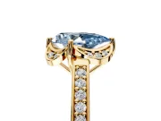 Floral Engagement Ring Setting for Fancy Blue Pear-Shaped Center with Four Accent Clusters and Prong Head in Yellow Gold