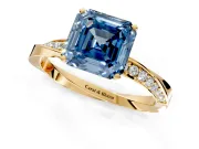 Side Accent Engagement Ring Setting for Fancy Blue Asscher Cut Center with Accent Shoulders and Prong Head in Yellow Gold