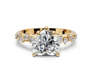 Solitaire Engagement Ring Setting for Heart-Shaped Center with Trailing Leaf Accent Band and Prong Head in Yellow Gold
