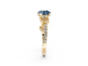 Leaf Motif Engagement Ring Setting for Fancy Blue Round Cut Center with Pave Band and Prong Head in Yellow Gold