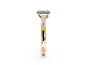 3 Stone Engagement Ring Setting for Emerald Cut Center with Tapered Baguettes, Plain Band and Prong Head in Yellow Gold