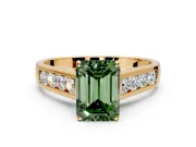 Solitaire Engagement Ring Setting for Fancy Green Emerald Cut Center with Cathedral Channel Band and Prong Head in Yellow Gold