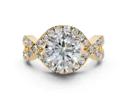 Halo Engagement Ring Setting for Round Cut Center with Pave Infinity Twist Band and Prong Head in Yellow Gold