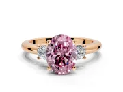 3 Stone Engagement Ring Setting for Fancy Pink Oval Center with Wide Plain Band and Prong Head in Rose Gold