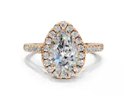Halo Engagement Ring Setting for Pear-Shaped Center with Narrowing Pave Band and Prong Head in Rose Gold