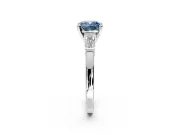 3 Stone Engagement Ring Setting for Fancy Blue Cushion Cut Center with Channel Baguette Accents and Prong Head in Platinum