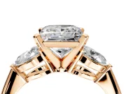 3 Stone Engagement Ring Setting for Princess Cut Center with Large Pear-Shaped Accents and Prong Head in Rose Gold