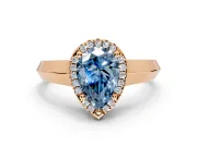 Halo Engagement Ring Setting for Fancy Blue Pear-Shaped Center with Knife Ridge Cathedral Band and Prong Head in Rose Gold