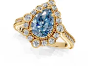 Milgrain Halo Engagement Ring Setting for Fancy Blue Pear-Shaped Center with Bezel Point Accents and Prong Head in Yellow Gold