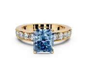 Solitaire Engagement Ring Setting for Fancy Blue Radiant Cut Center with Channel-Set Accents and Prong Head in Yellow Gold