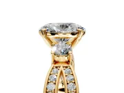 3 Stone Engagement Ring Setting for Oval Center with Pave Twist Band and Prong Head in Yellow Gold