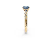 Cluster Engagement Ring Setting for Fancy Blue Cushion Cut Center with Round Cut Accent Band and Prong Head in Yellow Gold
