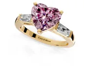 3 Stone Engagement Ring Setting for Fancy Pink Heart-Shaped Center with Tapered Baguettes, Plain Band and Prong Head in Yellow Gold
