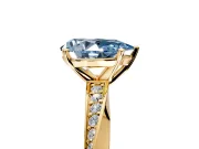 Side Accent Engagement Ring Setting for Fancy Blue Pear-Shaped Center with Accent Shoulders and Prong Head in Yellow Gold