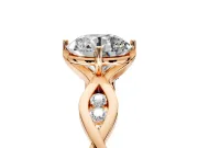 Solitaire Engagement Ring Setting for Round Cut Center with Accented Twist Band and Leaf Prong Head in Rose Gold