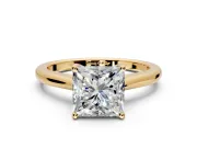 Solitaire Engagement Ring Setting for Princess Cut Center with Narrow Cathedral Band and Prong Head in Yellow Gold
