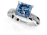 Solitaire Engagement Ring Setting for Fancy Blue Princess Cut Center with Raised Channel Band and Prong Head in Platinum