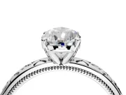 Solitaire Engagement Ring Setting for Pear-Shaped Center with Scrollwork Band and Prong Head in Platinum