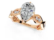 Solitaire Engagement Ring Setting for Pear-Shaped Center with Accented Twist Band and Leaf Prong Head in Rose Gold