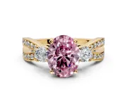 3 Stone Engagement Ring Setting for Fancy Pink Oval Center with Pave Twist Band and Prong Head in Yellow Gold